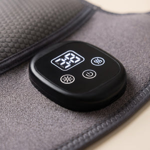 Detaliu panou de control tactil cu afisaj digital, butoane pentru incalzire si vibratii